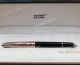 AAA Replica Montblanc Rose Gold & Black Resin Rollerball Pen Mens Gift (2)_th.jpg